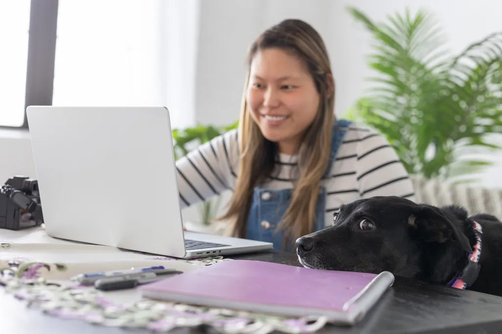 dog with her dog mom at her computer