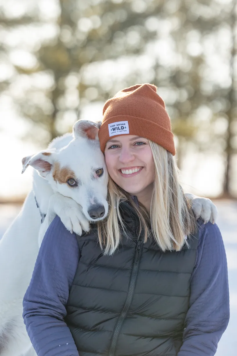 dog doing selfie pose on mom