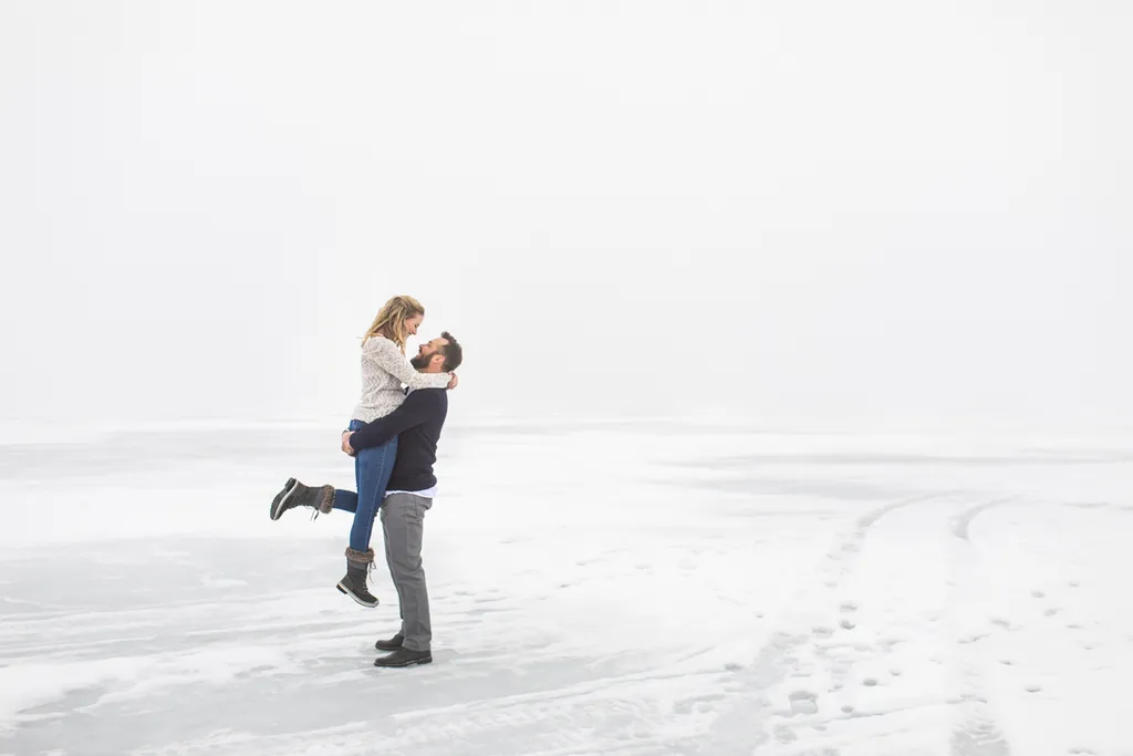 engagement photos in dense fog on lake minnetonka