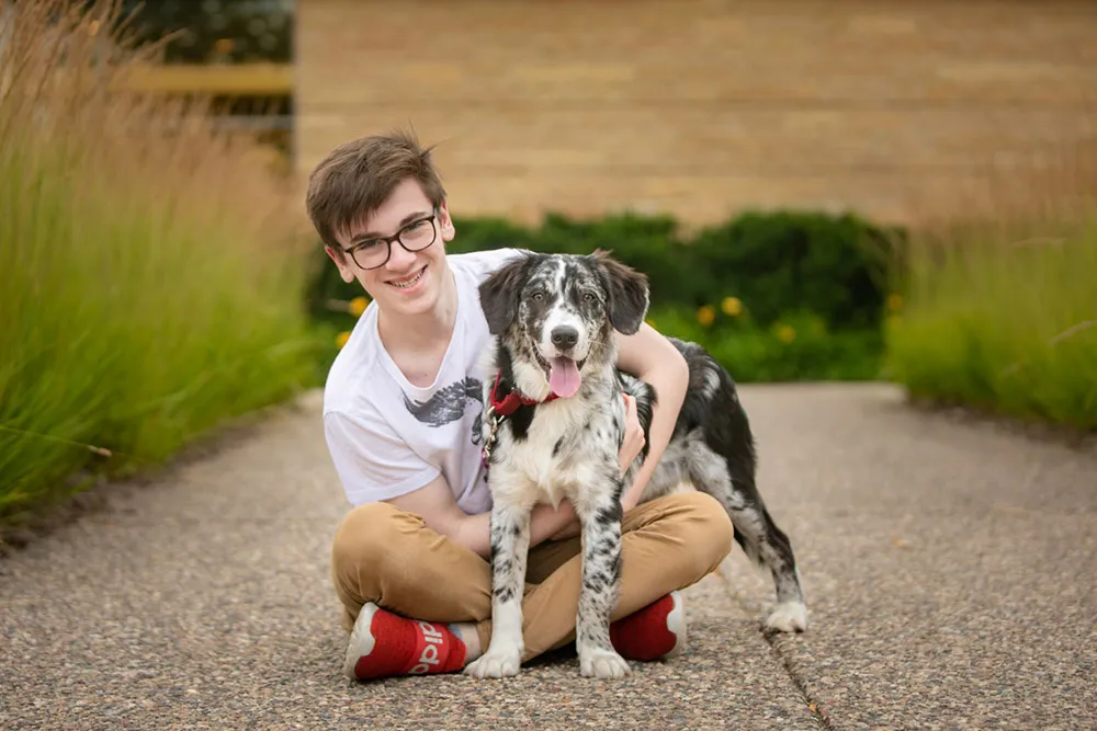 a boy and his puppy